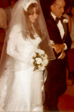 Jeanie walking down the isle with her Dad