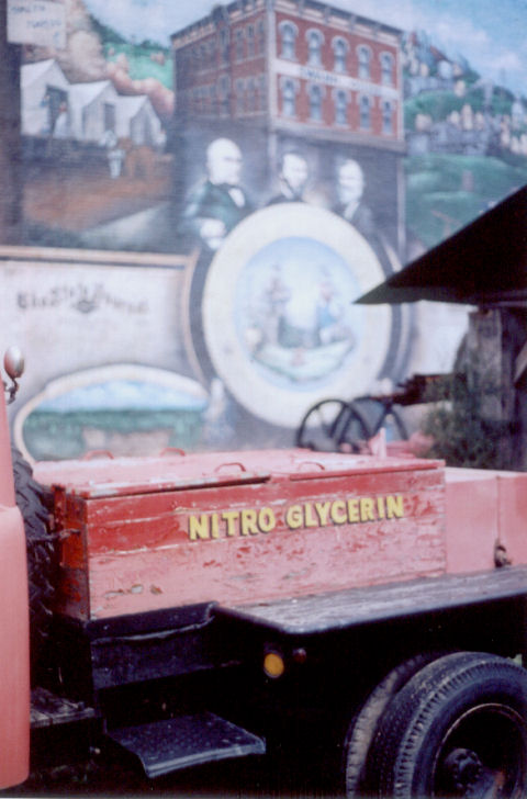 nitro truck in front of mural