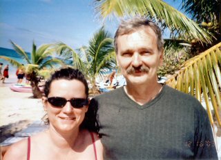 Dave and Jeanie on the beach in Roatan, Honduras